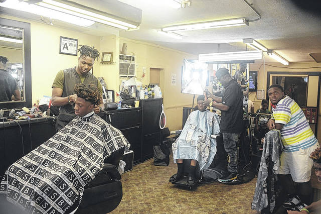 Las Vegas Raiders help local students with back-to-school haircuts