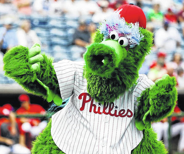 Baseball mascot shoots hot dog at woman's face at Philadelphia Phillies  game, The Independent