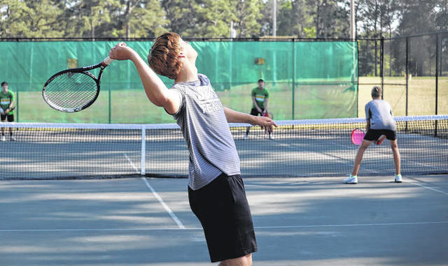 
			
				                                
			
				                                
			
				                                
			
				                                Scotland's Nick Eury hits a serve during his and Drew Hamilton's match against Richmond's Ty Murray and Bradford Pittman.  Neel Madhavan |  Daily Journal & Laurinburg Exchange

			
		