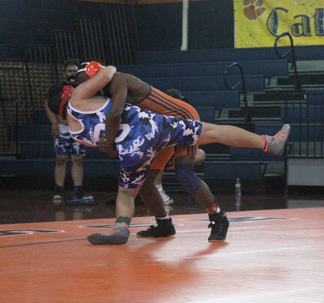 
			
				                                A Scotland wrestler competes against an Anson wrestler at Tuesday’s tri-match.
                                 Elizabeth O’Connell | Anson Record

			
		