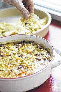 For Super Bowl entertaining, make room for melty hot dips – News