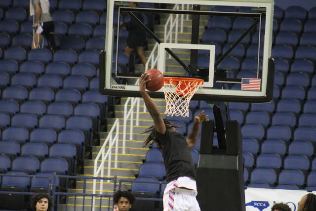 Giants rookie QB was quite the B-Ball player, he dunked on a 5