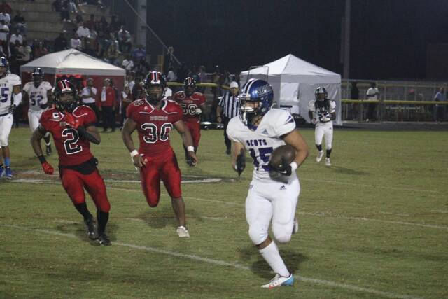 New York Giants tackle Sean Locklear (75) blocks Washington